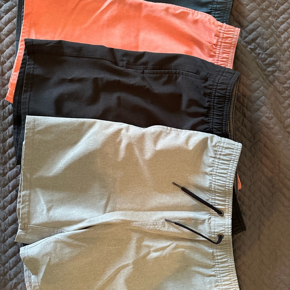 Set of four boy’s O’Neil shorts in Black, Gray, Blue and Coral